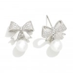 Metal Tone Cubic Zirconia Studded Bow Earrings With Pearl Accent 

- Approximately .75" L 