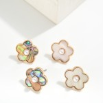 Pearlescent Flower Stud Earrings Featuring Pearl Accent 

- Approximately .75" L
- Hypoallergenic Brass Base 