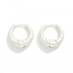 Textured Metal Tapered Huggie Hoop Earrings

- Approximately .5" D 