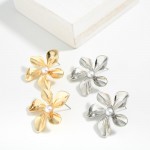 Metal Tone Flower Stud Earrings With Pearl Detail 

- Approximately 1" L