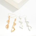 Wavy Metal Tone Drop Earrings

- Approximately 2" L