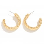 Chunky Textured Metal Hoop Earrings

- Approximately 1" D