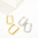 Do Everything In Love Cubic Zirconia Rounded Rectangle Huggie Hoop Earrings

- Brass Base
- Hypoallergenic
- White / 14K Gold Dipped
- Made In Korea
- Approximately .25" D