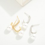 Do Everything In Love Cubic Zirconia Post Drop Half Hoop Earrings Featuring Pearl Detail

- Brass Base
- Hypoallergenic
- White / 14K Gold Dipped
- Made In Korea
- Approximately .5" D