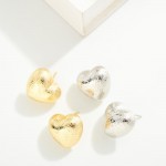 Do Everything In Love Dimpled Heart Stud Earrings

- Brass Base
- Hypoallergenic
- White / 14K Gold Dipped
- Made In Korea
- Approximately 0.75"L