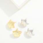 Do Everything In Love Textured Metal Star Earrings

- Brass Base
- Hypoallergenic
- White / 14K Gold Dipped
- Made In Korea
- Approximately .75" L