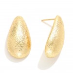 Do Everything In Love Textured Metal Teardrop Post Drop Earrings

- Brass Base
- Hypoallergenic
- White / 14K Gold Dipped
- Made In Korea
- Approximately 1" L