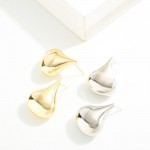 Do Everything In Love Metal Tone Teardrop Post Drop Earrings

- Brass Base
- Hypoallergenic
- White / 14K Gold Dipped
- Made In Korea
- Approximately 1" L