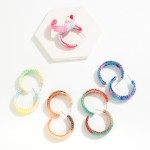 Gradient Raffia Wrapped Hoop Earrings

- Approximately 1.5" D