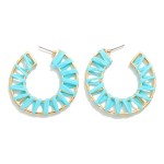 Circular Drop Earring Featuring Raffia Wrapped Detail

- Approximately 2"L