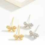 Gold Dipped Cubic Zirconia Bow Stud Earrings 

- Approximately .25" L
- Sterling Silver Post 