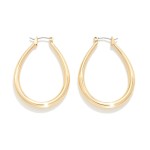 Simple Tapered Hollow Coated Brass Hoop Earrings

- Brass Base
- Hypoallergenic
- Approximately 1.5" L