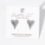 Metal Tone Heart Stud Earrings Featuring Cubic Zirconia Accents 

- Gold Dipped
- Approximately .5" L
