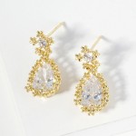 Cubic Zirconia Teardrop Post Drop Earrings Featuring Metal Tone Flower Border 

- Gold Dipped
- Approximately .75" L