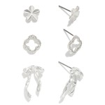 Set Of Three Earrings Featuring Bow, Flower, And Clover With Rhinestone Border 

- Approximately .5" - .75" L