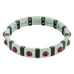 Two tone rhinestone color stretch bracelet. 

- Approximately 3" in diameter unstretched 
- Fits up to a 6" wrist 