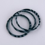 Faux leather wrapped zebra print bangle bracelet set of three.

 - Approximately 3" in diameter
- Fits up to a 6" wrist