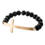 Facet Beaded Stretch Bracelet Featuring an East West Cross Focal. 

- Approximately 3" Diameter 