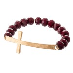 Facet Beaded Stretch Bracelet Featuring an East West Cross Focal. 

- Approximately 3" Diameter 