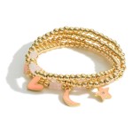 Set of Four Gold Charm Bracelets featuring Beaded Accents.

- Approximately 2.5" in Diameter