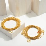 Gold Stackable Cord Bracelet Set Featuring Texas Charms 

- Approximately 2.5" in Diameter