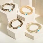 Set of Three Beaded Stretch Bracelets Featuring Glass Beads and Evil Eye Accents

- Approximately 3" Diameter