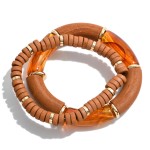 Set of Two Beaded Bracelets Featuring Wood and Acrylic Tube Beads With Metal Disk Accents.

- Approximately 2.5" Diameter