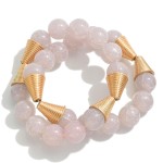 Set of Two Beaded Stretch Bracelet Featuring Large Stone and Gold Cone Beads

- Approximately 2.5" Diameter 