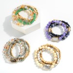 Set of 4 Beaded Stretch Bracelet Featuring Wood, Gold and Rhinestone Accents

- Approximately 2.5" Diameter 