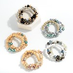 Set of Three Beaded Stretch Bracelet Featuring Wood, Disco, and Painted Honeycomb Beads

- Approximately 2.5" Diameter 