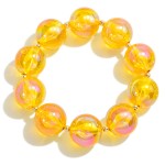 Chunky Circular Bead Stretch Bracelet With Gold Tone Accents

- Approximately 2.25" Diameter  