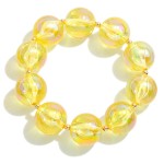 Chunky Circular Bead Stretch Bracelet With Gold Tone Accents

- Approximately 2.25" Diameter  