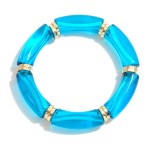 Translucent Acrylic Tube Bead Stretch Bracelet With Gold Tone Disk Accents

- Approximately 2.5" Diameter 