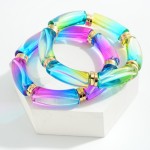 Translucent Iridescent Tube Bead Stretch Bracelet With Gold Accents 

- Approximately 2.5" Diameter 