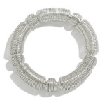 Metal Stretch Coil Bracelet With Taper Detail 

- Approximately 2.5" D