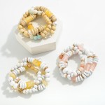 Set of 3 Beaded Stretch Bracelets Featuring Wood, Stone, and Porcelain Beads

- Approximately 2.5" Diameter 