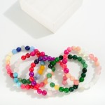 Multi Tone Beaded Stretch Bracelet

- Approximately 3" Diameter