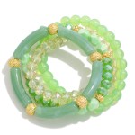 Set of Four Acrylic Tube and Glass Beaded Stretch Bracelets With Gold Tone Accents

 - Approximately 2.5" Diameter