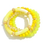 Set of Four Acrylic Tube and Glass Beaded Stretch Bracelets With Gold Tone Accents

 - Approximately 2.5" Diameter