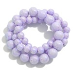 Set of Three Pearlescent Beaded Stretch Bracelets With Graduating Bead Size

- Approximately 2.5" D