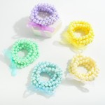 Set of Five Pearlescent Beaded Stretch Bracelet Set With Tied Bow Detail

- Approximately 2.5" D