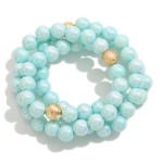 Wholesale set Three Pearlescent Beaded Stretch Bracelets Dimpled Gold Bead Accen