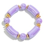 Chunky Abalone Tube and Circular Bead Stretch Bracelet With Gold Tone Accents

- Approximately 2.5" D