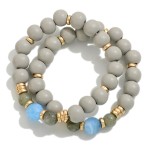 Set of Two Wood Beaded Stretch Bracelets Featuring Natural Stone Bead Accents

- Approximately 2.5" D