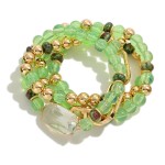 Set of Four Beaded Stretch Bracelets Featuring Rhinestone Station and Chain Link Accents

- Approximately 2.5" D