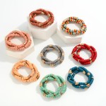 Set of Three Wood Disc Beaded Stretch Bracelets

- Approximately 2.5" D