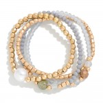 Set of Four Dainty Beaded Stretch Bracelets Featuring Pearl Station 

- Approximately 2.5"D