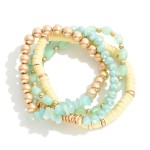 Set of Four Beaded Stretch Bracelets Featuring Heishi Details

- Approximately 2.5" D