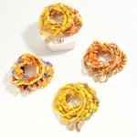 Set of Eight Beaded Stretch Bracelets Featuring Gold Accents & Textured Beads With Coin Charms

- Approximately 3.5" D