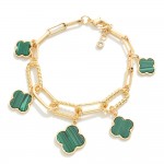 Gold Dipped Chain Link Bracelet Featuring Twisted Metal Links & Clover Charms

- Approximately 3" D
- .75" Extender 